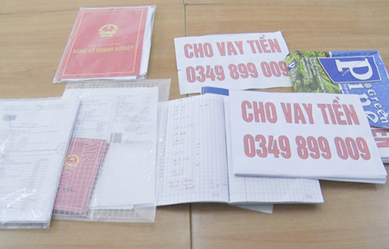 Sổ sách, giấy tờ phục vụ cho hoạt động cho vay nặng lãi mà cơ quan công an thu giữ được  Ảnh do cơ quan công an cung cấp
